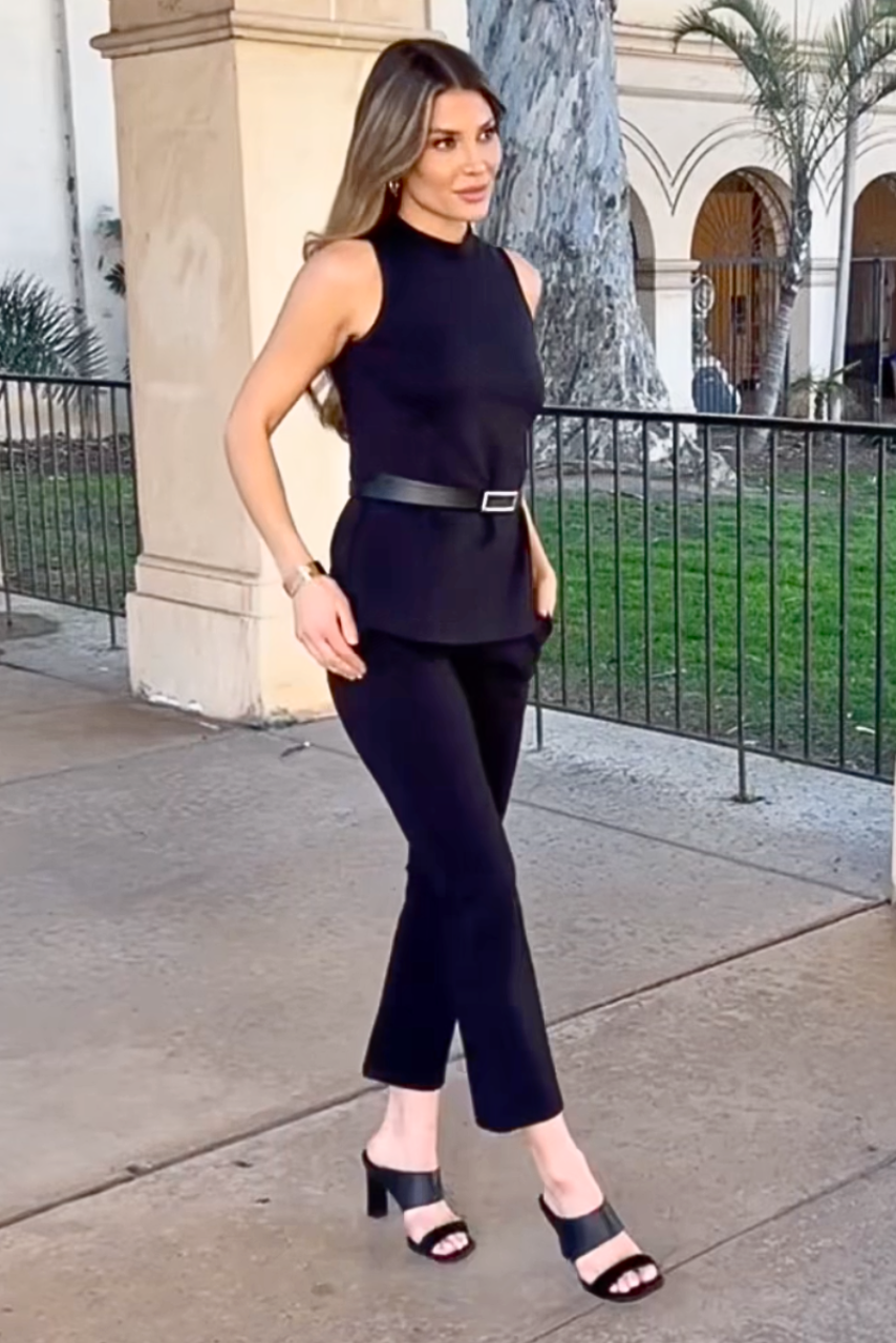 Video of model posing in black Julia Mock Top and matching black High Waist Ankle Kick Pant